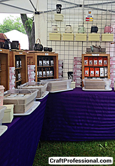 Plenty of storage under the tables of the craft booth.