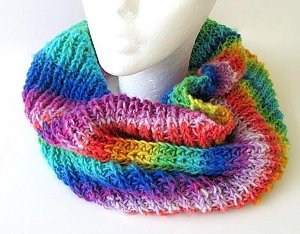 Colorful knit scarf by All About the Buttons