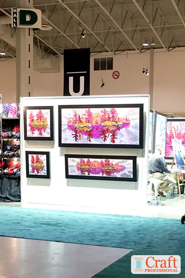 Paintings on display at an art show