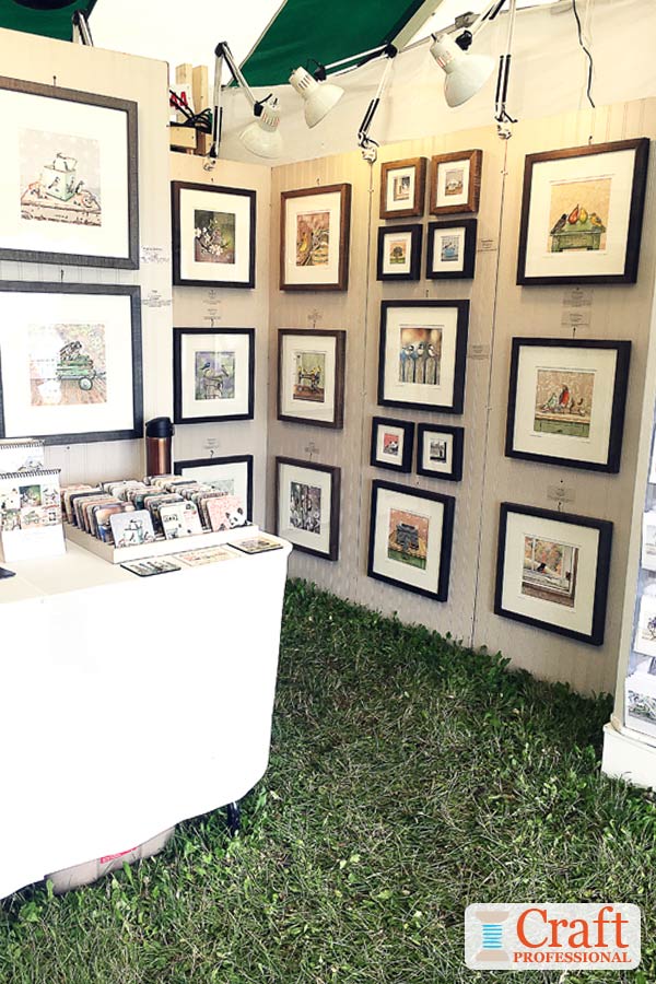 Art prints in a craft show booth