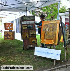 Paintings displayed on easels
