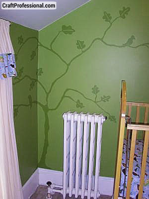 Tree silhouette mural in the corner of a baby's nursery Tree silhouette mural in the corner of a baby's nursery