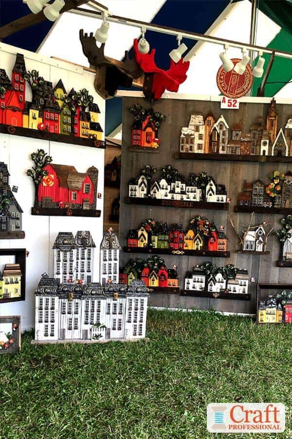 Home decor displayed at an outdoor craft show. Home decor displayed at an outdoor craft show.