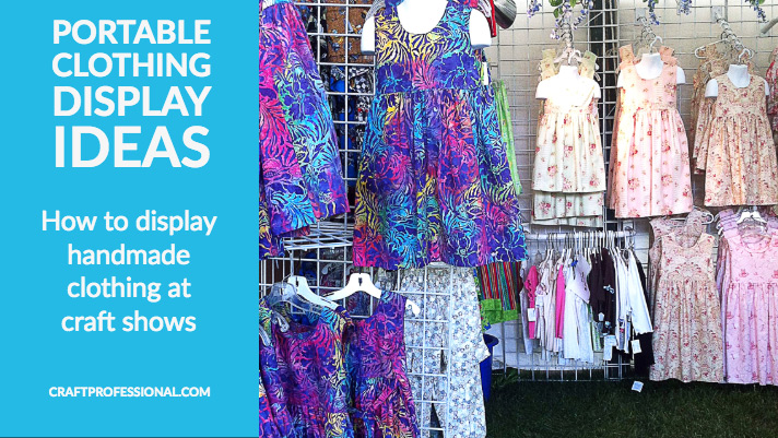 Handmade clothing on display at an outdoor craft fair