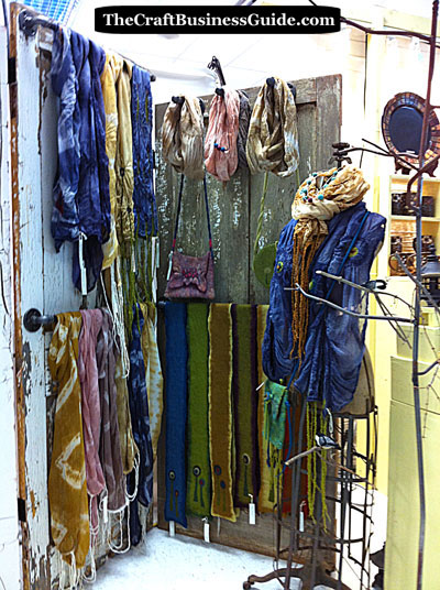 Handmade fashion accessories displayed at a craft show. Handmade fashion accessories displayed at a craft show.