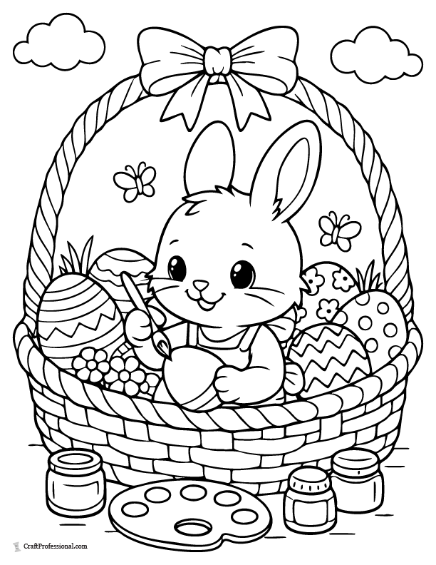Easter basket coloring page with a bunny painting Easter eggs inside a basket.