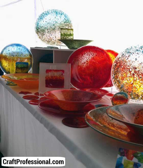 Colorful glassware on a tabletop display. Colorful glassware on a tabletop display.