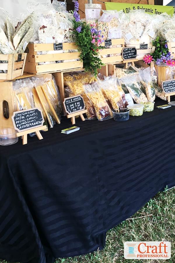 Handmade pasta on a tabletop display at a craft show. Handmade pasta on a tabletop display at a craft show.