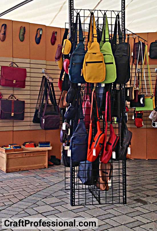 Purse display using grid walls and slat walls Purse display using grid walls and slat walls