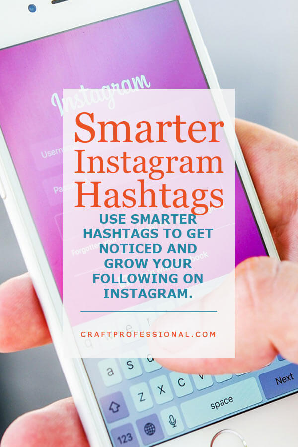Hand holding smart phone with text overly Smarter Instagram Hashtags