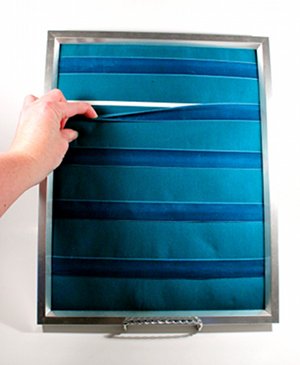 Handmade jewelry display stand with ribbon covering elastic to hold earring cards