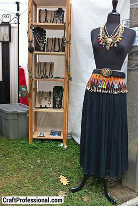 Handmade necklaces displayed on a dressmaker's form Handmade necklaces displayed on a dressmaker's form