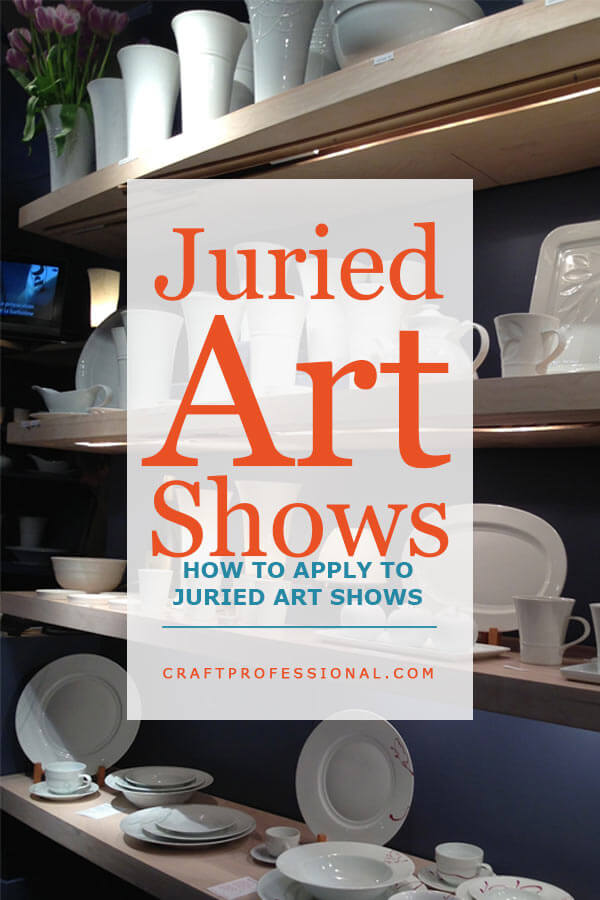 White handmade pottery displayed on rows of shelves at a craft show. Text overlay - Juried Art Shows - How to apply to juried art and craft shows.