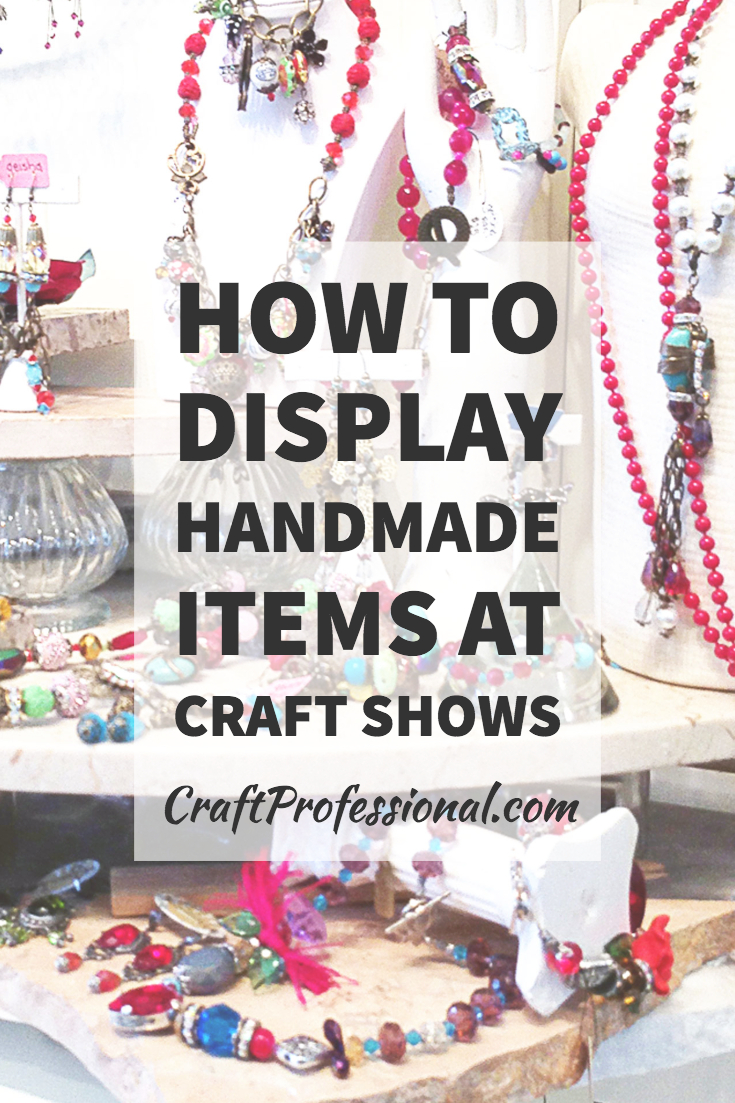 Handmade jewelry displayed in a retail shop with text overlay How to display handmade items at craft shows.