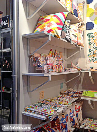 Simple shelves displaying pillows.
