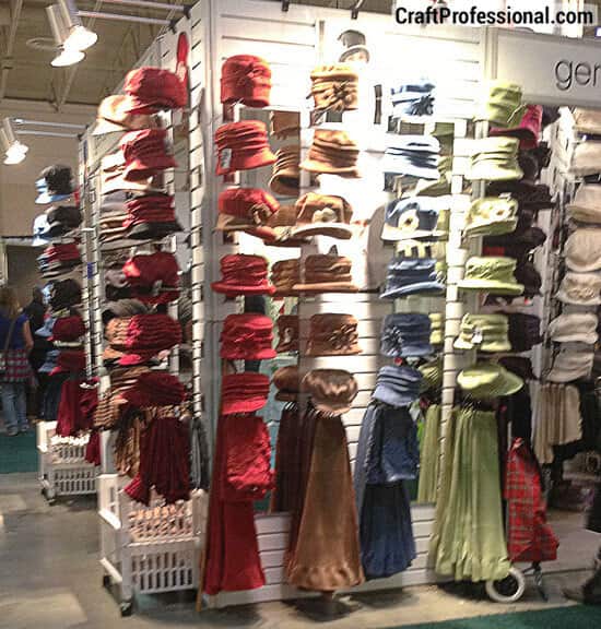 Hats and scarves displayed on slatwalls