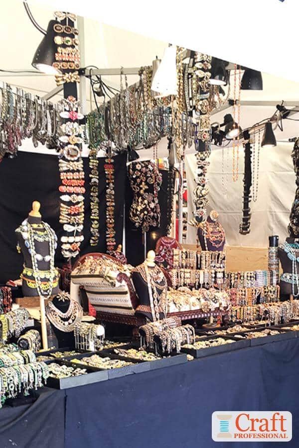 Sparkling handmade jewelry on display at a craft show Sparkling handmade jewelry on display at a craft show