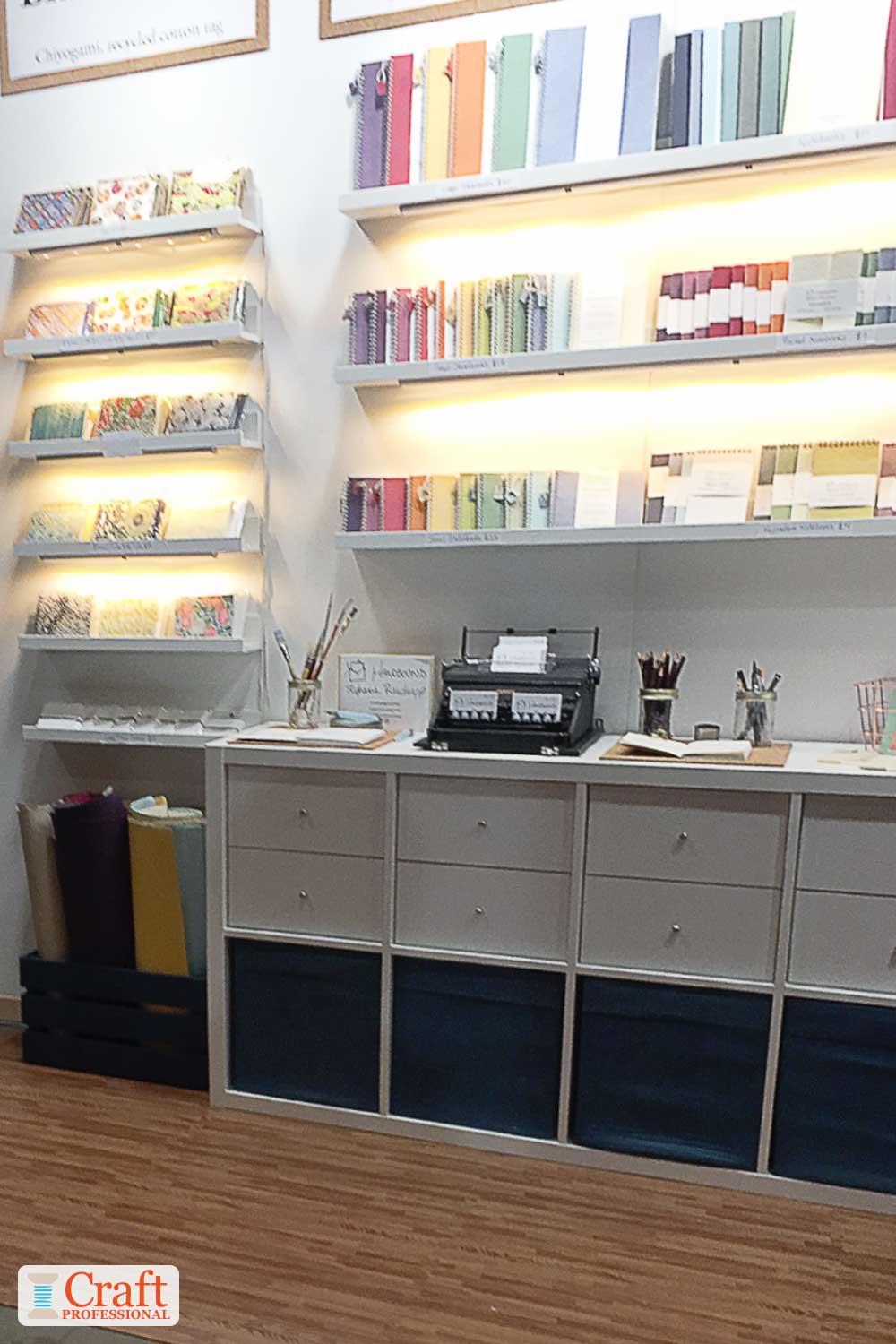 Stationery displayed on shelves at a craft fair Stationery displayed on shelves at a craft fair